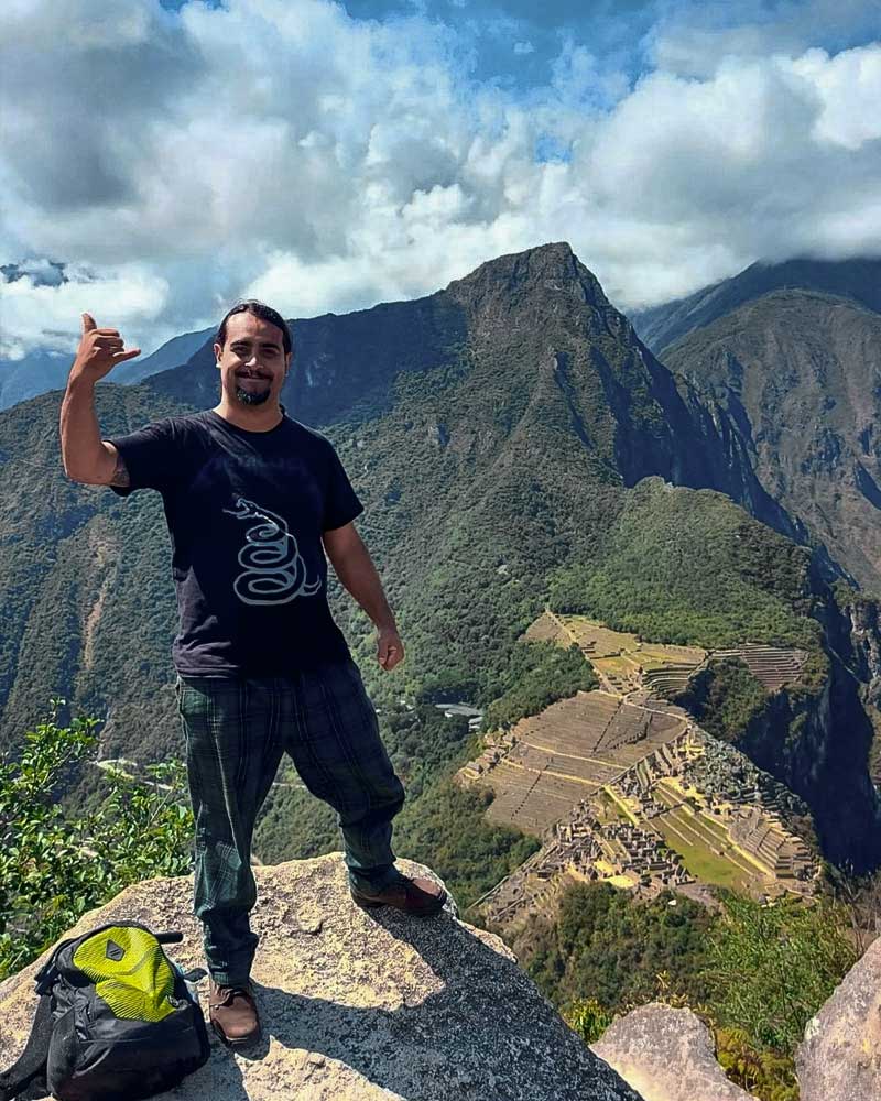 A tourist at the Huayna Picchu viewpoint