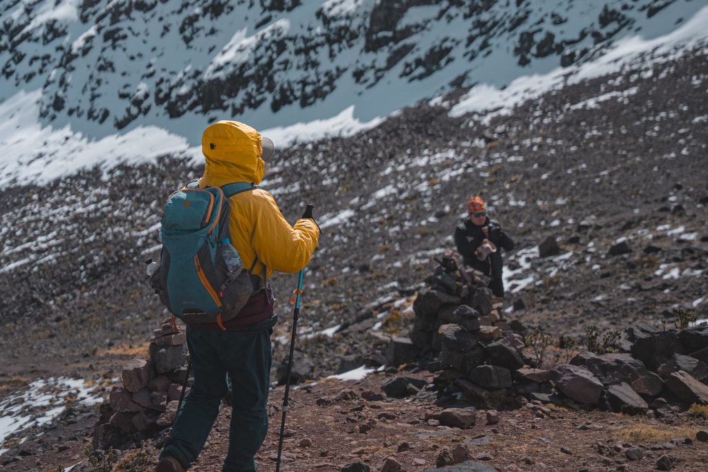 Tourists with high-altitude trekking equipment