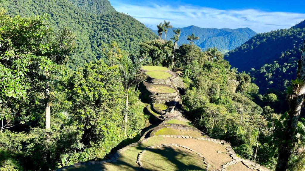 A panoramic view of the ancient stone terraces of the Lost City hidden deep within the Sierra Nevada jungle.