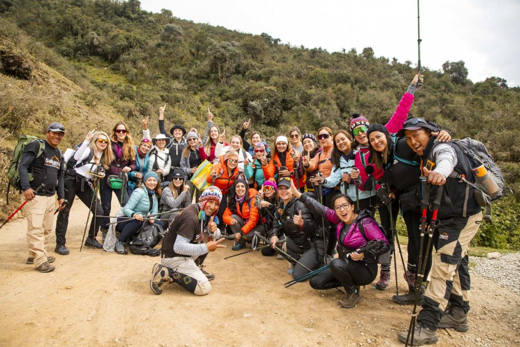 Large group of tourists at the start of their hike up Salkantay Mountain