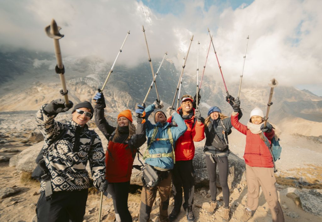 People celebrating their arrival at the Salkantay Pass