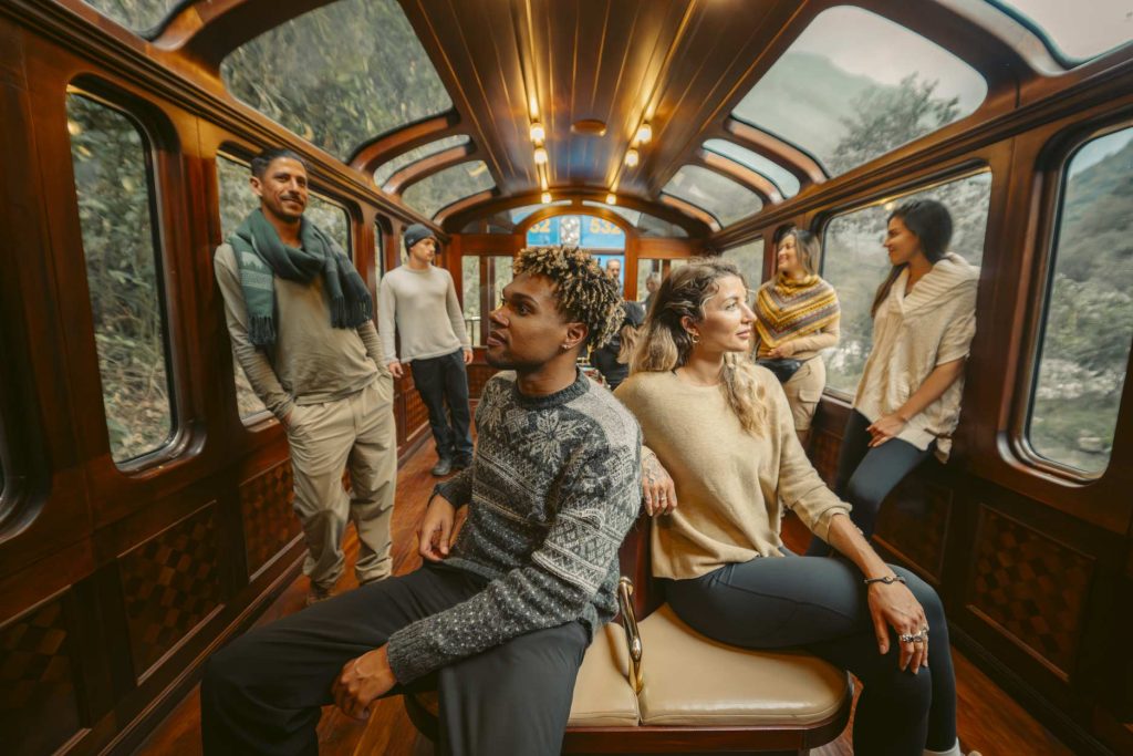 Group of tourists on the Perurail train to Machu Picchu