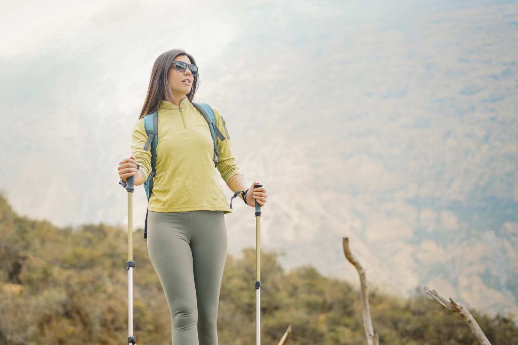 A tourist hiking in the Andean mountains of Cusco