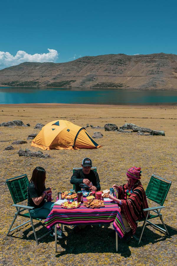 Guests enjoying their meals in a outdoor dining room