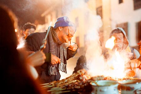 Tourists enjoying street food in Cusco