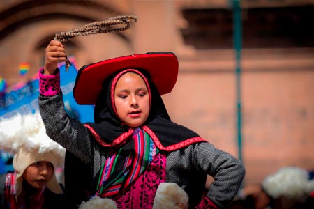 Girl dancing in the festivities of Cusco in June