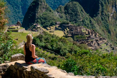 Traveler in the famous archaeological site of Machu Picchu