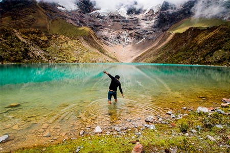 Tourist enjoying in the humantay lake
