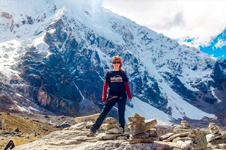 Tourist next to the Salkantay mountain at more than 4650 meters above sea level