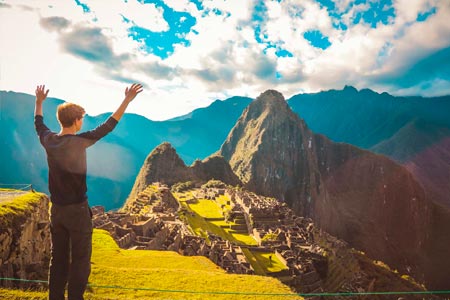 Tourist impressed with the vastness of Machu Picchu
