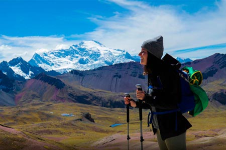 Happy traveler with the energy of the Andes mountains