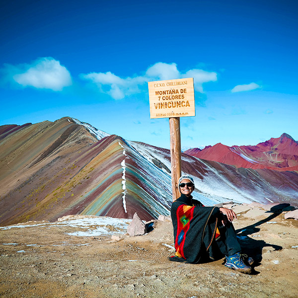 The imposing Rainbow Mountain, through the fascinating cloud forest