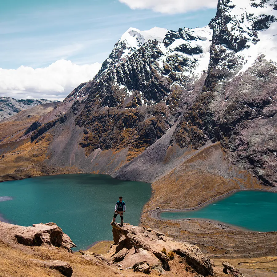 Impressed tourist in front of the majestic Ausangate mountain