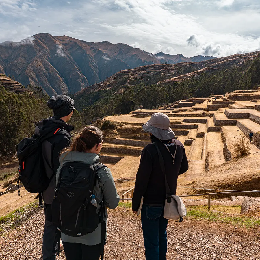 A happy tourist couple in the Salt Mines of Maras