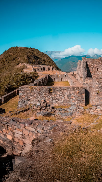 Ruins of Choquequirao in middle of big vegetation