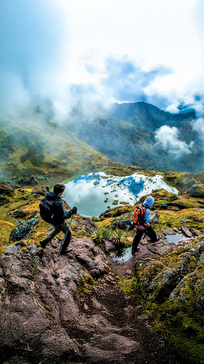 Hiking lovers near the lakes around Quiswarani in the lares trek route to Machu Picchu