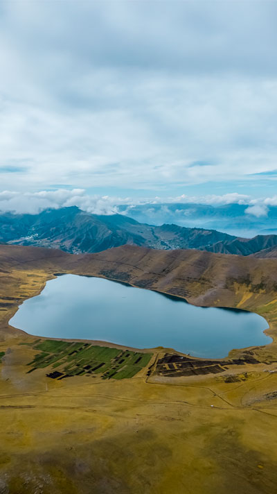 Qoriqocha or Qoricocha Lake, the mirror in the Andes reflecting the blue sky during our hike to Huchuy Qosqo
