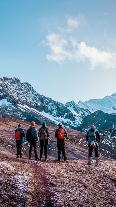 Snow covering the colorful mountains near the Rainbow Mountain of Peru