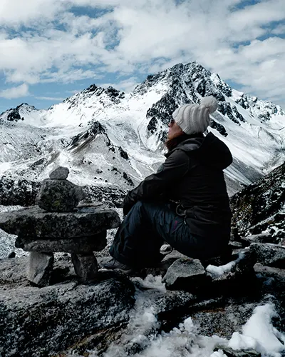 Tourist resting on the open after the arduous trek Salkantay