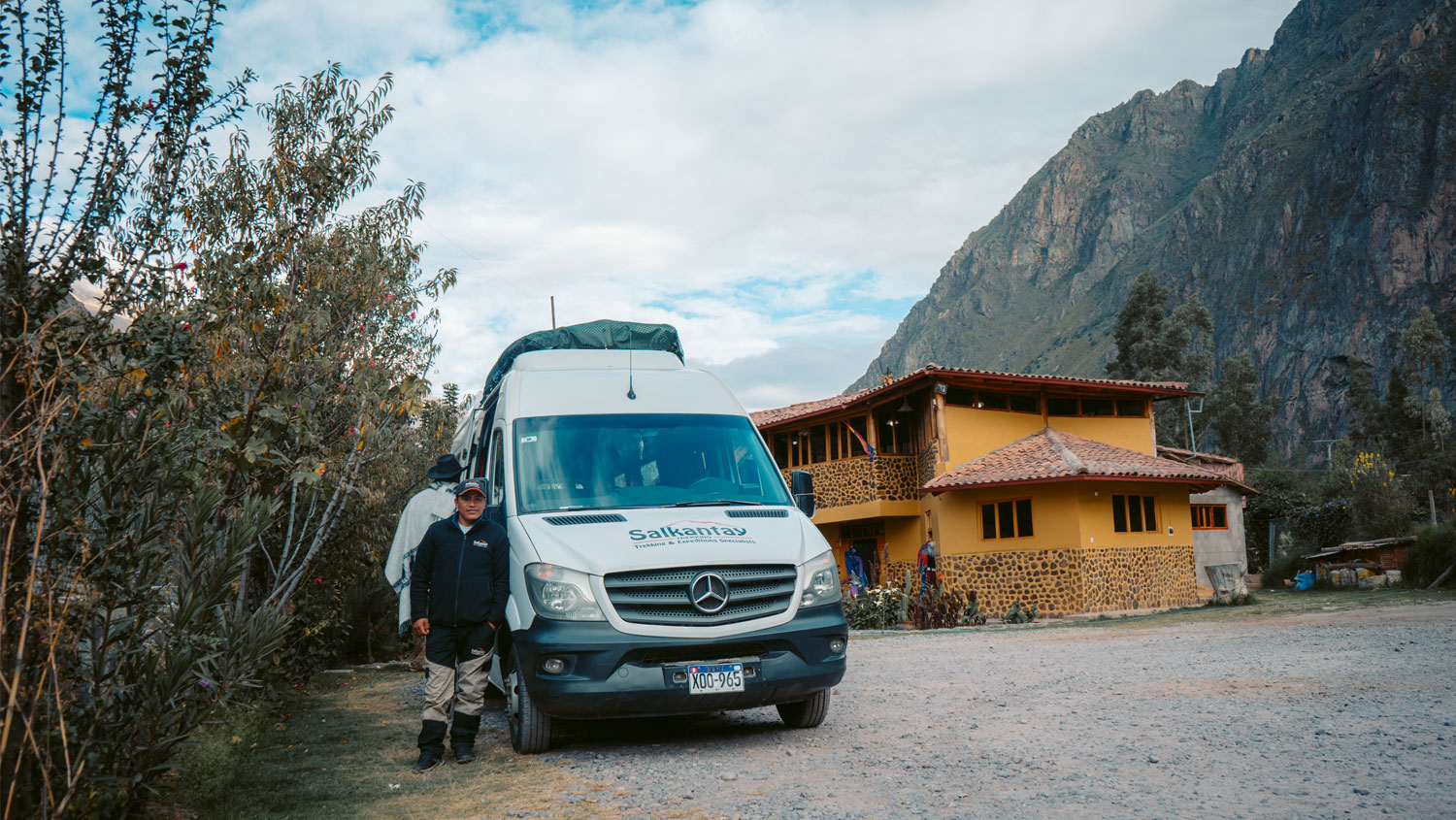 Salkantay Trekking driver next to the company van