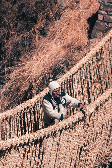 Andean person on Qeswachaka bridge