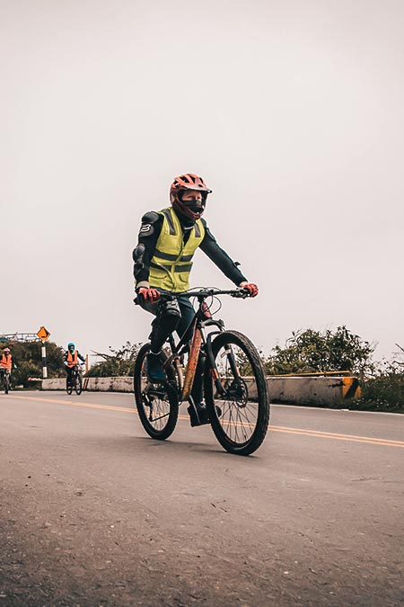 Tourists cycling on the Inca Jungle route